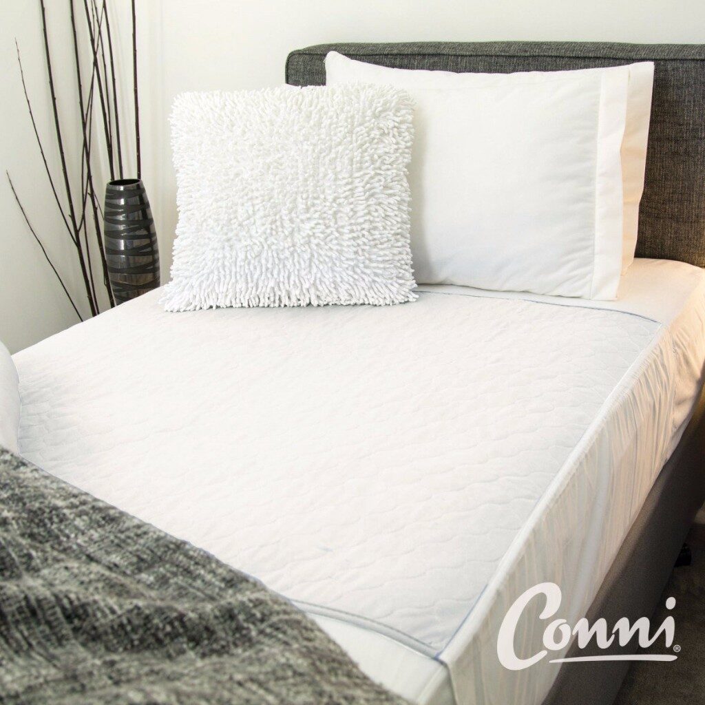 Conni Bed Pad with TuckIns ASTEC
